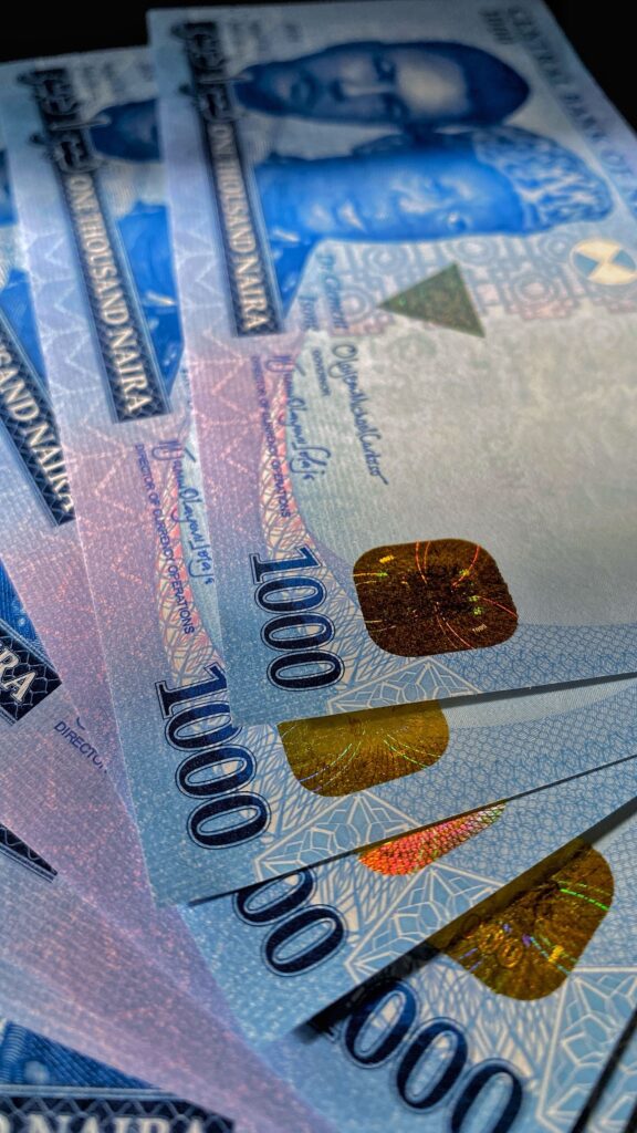 A close-up of Nigerian naira banknotes