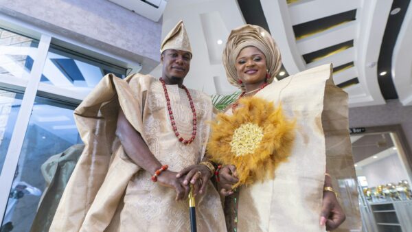 A man and a woman wearing traditional clothing
