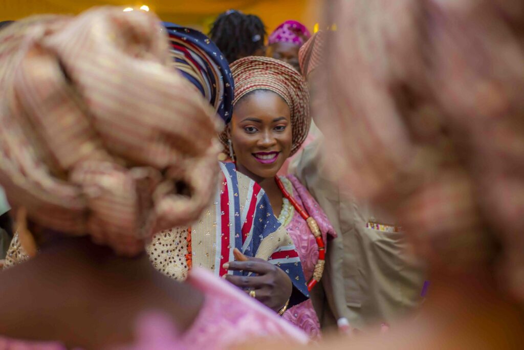 Side profile of a woman wearing a multicoloured dress