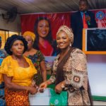 over200elderlywomenreceivechristmasfoodsupportfromisokosouthchairpersonE28099swife41738325934353010335